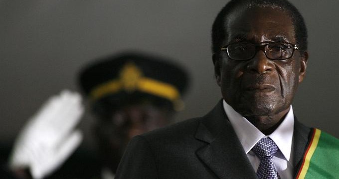 (FILES) In this file photo taken on June 29, 2008, Zimbabwean then President Robert Mugabe is sworn in for a sixth term in office in Harare after being declared the winner of a one-man election. - Robert Mugabe, who led Zimbabwe with an iron fist from 1980 to 2017, has died aged 95, Zimbabwe President Emmerson Mnangagwa announced September 6, 2019. (Photo by ALEXANDER JOE / AFP)