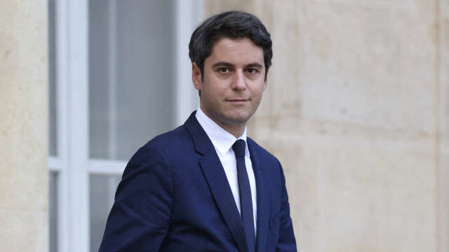 French Education and Youth Minister Gabriel Attal leaves after the weekly cabinet meeting at the presidential Elysee Palace in Paris, on December 20, 2023. (Photo by Ludovic MARIN / AFP)