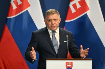 (FILES) Slovakia's Prime Minister Robert Fico gestures as he addresses a press conference with his Hungarian counterpart at Carmelita monastery in Budapest on January 16, 2024. Slovak Prime Minister Robert Fico was on May 15, 2024 shot and hospitalised after a cabinet meeting in the central town of Handlova, local media said. (Photo by ATTILA KISBENEDEK / AFP)